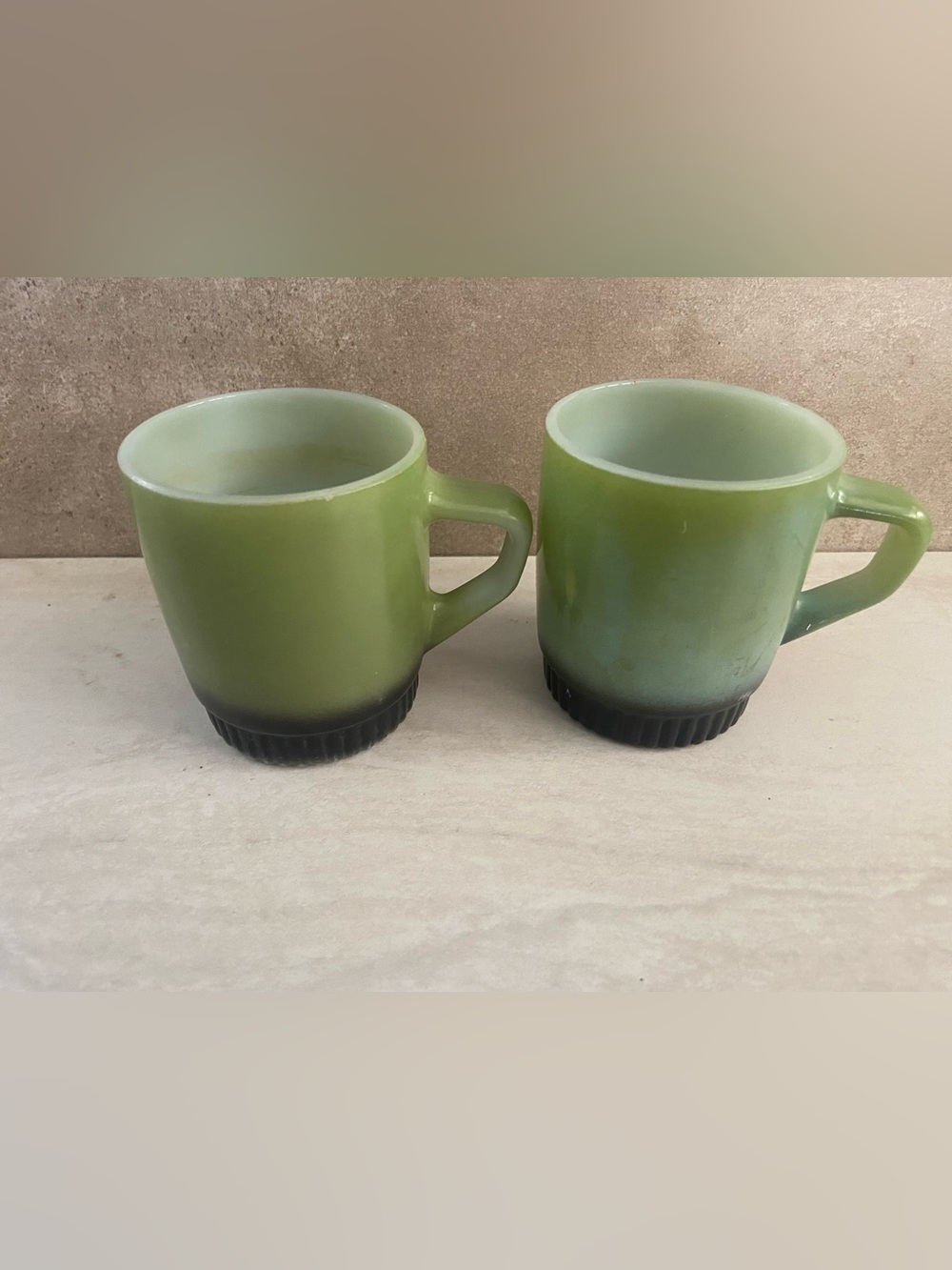 2 Vtg Avocado Green Black Bottom Fire King Anchor Hocking Stacking
Coffee Mugs